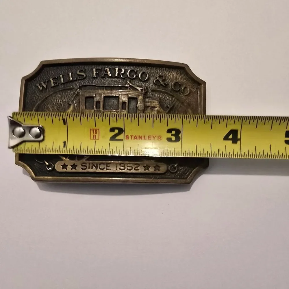 Vintage Wells Fargo‎ & Co.Brass Belt Buckle, likely from 1972.